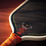 Handle of the Bread & Butter Loco 16mm Elongated pickleball paddle — 5.5 in grip length, 4.25 in circumference