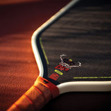 Macro view of the Carbon–fiberglass–carbon face texture on the Bread & Butter Loco 16mm Hybrid that generates its spin