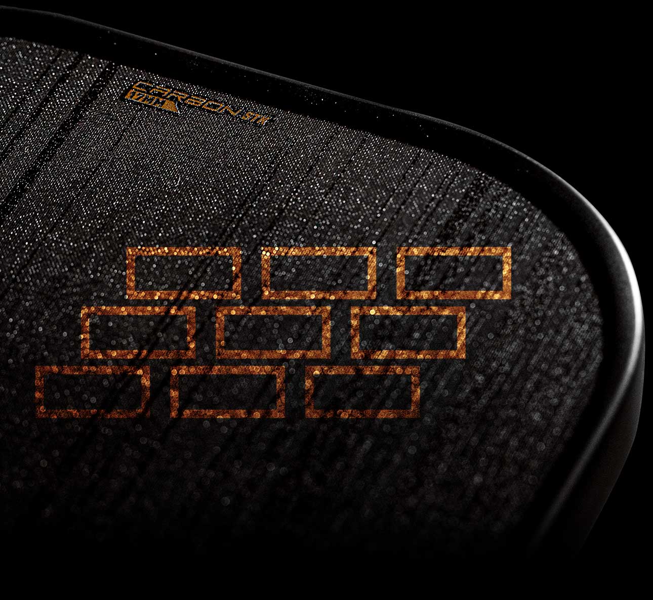 Macro view of the Raw carbon face texture on the Franklin Signature Carbon STR that generates its spin