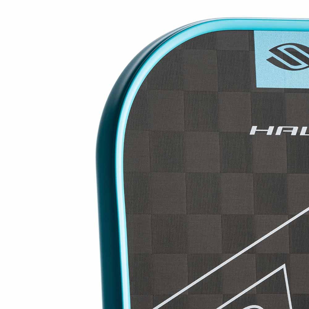 Macro view of the Raw T700 carbon fiber face texture on the Selkirk SLK Halo XL Control that generates its spin